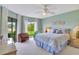 Inviting bedroom with relaxing view of the outdoors, neutral carpet and comfortable seating at 601 Shreve St # 13A, Punta Gorda, FL 33950