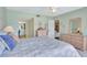 Light-filled main bedroom with soft decor, ensuite access, and comfortable furniture at 601 Shreve St # 13A, Punta Gorda, FL 33950