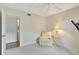 Comfortable and bright bedroom with seating area and connecting bath at 601 Shreve St # 13A, Punta Gorda, FL 33950