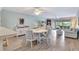 Open floor plan with living and dining room featuring lots of natural light at 601 Shreve St # 13A, Punta Gorda, FL 33950