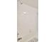 Standard shower with white tile and chrome fixtures at 601 Shreve St # 13A, Punta Gorda, FL 33950