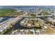 An aerial view shows the community is located on canals and bayous at 120 Buckeye Nw Ave, Port Charlotte, FL 33952