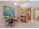 Cozy breakfast nook with tile flooring and easy access to the kitchen and stainless steel appliances at 120 Buckeye Nw Ave, Port Charlotte, FL 33952