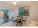 Charming breakfast nook with a view of the lanai, perfect for casual dining and relaxation at 120 Buckeye Nw Ave, Port Charlotte, FL 33952