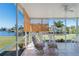 The screened lanai offers tranquil canal views and a relaxing space at 120 Buckeye Nw Ave, Port Charlotte, FL 33952