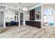 Lavish main bathroom with dual vanities, a makeup counter, a soaking tub, and elegant finishes at 13000 Windcrest Dr, Port Charlotte, FL 33953