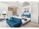 Elegant main bedroom featuring a hide-away TV and integrated storage at 13000 Windcrest Dr, Port Charlotte, FL 33953