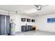 Organized garage featuring storage cabinets, epoxy floor, and a clean, functional space at 1301 Appian Dr, Punta Gorda, FL 33950