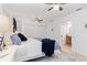 Well lit main bedroom with en suite bathroom and multiple closets at 1301 Appian Dr, Punta Gorda, FL 33950
