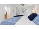 Well lit main bedroom shows an en suite bathroom and neutral decor at 1301 Appian Dr, Punta Gorda, FL 33950