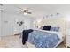 Comfortable main bedroom with blue accents and a dresser at 1301 Appian Dr, Punta Gorda, FL 33950