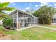 Screened in pool area with lots of room for entertaining at 1301 Appian Dr, Punta Gorda, FL 33950