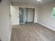 Neutral bedroom featuring tile flooring, closet space, and natural lighting at 18098 Petoskey Cir, Port Charlotte, FL 33948