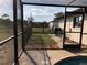 View from lanai showcasing fenced backyard at 21363 Cottonwood Ave, Port Charlotte, FL 33952