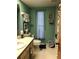 Full bathroom featuring a shower and tub combo, single sink vanity, and neutral decor at 21363 Cottonwood Ave, Port Charlotte, FL 33952