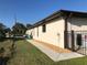 Home exterior featuring well-maintained landscaping, gutters and security camera at 21363 Cottonwood Ave, Port Charlotte, FL 33952