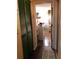 Hallway view into a laundry room area with a washer and dryer near closet space at 21363 Cottonwood Ave, Port Charlotte, FL 33952