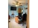 Comfortable home office featuring tile floors and a ceiling fan at 21363 Cottonwood Ave, Port Charlotte, FL 33952