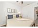 Comfortable bedroom featuring a cozy bed and neutral decor at 25120 E Lenox Cir, Punta Gorda, FL 33950