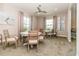 Cozy game room with round tables, comfortable seating, and elegant decor for community gatherings at 25120 E Lenox Cir, Punta Gorda, FL 33950