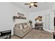 Comfortable living room with a sofa, desk, and decorative accents, creating a welcoming atmosphere at 25120 E Lenox Cir, Punta Gorda, FL 33950