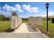 Mailboxes with a sidewalk in a community with grassy areas at 25120 E Lenox Cir, Punta Gorda, FL 33950
