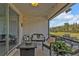 Enjoy outdoor living on this covered patio, complete with stylish seating and views at 25120 E Lenox Cir, Punta Gorda, FL 33950