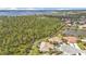 Expansive aerial view of the home with a pool and view of the water at 2892 Myakka Creek Ct, Port Charlotte, FL 33953