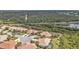 Aerial view of homes with screened-in pools near trees at 2892 Myakka Creek Ct, Port Charlotte, FL 33953