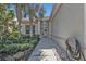 Charming single story home with a tile roof, manicured landscaping, and a covered front entrance at 2892 Myakka Creek Ct, Port Charlotte, FL 33953