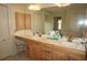 Spacious bathroom featuring and sinks, a large mirror, and ample counter space at 379 Bal Harbor Blvd, Punta Gorda, FL 33950