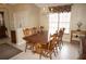 Elegant dining area with a classic wooden table set and tiled floors, perfect for gatherings at 379 Bal Harbor Blvd, Punta Gorda, FL 33950