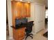 Kitchen workstation with wood cabinets and drawers is perfect for homework or paying bills at 379 Bal Harbor Blvd, Punta Gorda, FL 33950