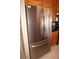 Stainless steel French door refrigerator in this updated kitchen has ample storage at 379 Bal Harbor Blvd, Punta Gorda, FL 33950