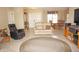 Bright and airy living room showcasing tile flooring and an open layout that flows into the dining area at 379 Bal Harbor Blvd, Punta Gorda, FL 33950