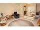 Spacious living room with tile flooring, comfortable seating, and natural light, enhancing the home's welcoming ambiance at 379 Bal Harbor Blvd, Punta Gorda, FL 33950