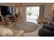 Open-concept living room with a seamless transition to a screened-in porch and a waterfront view at 379 Bal Harbor Blvd, Punta Gorda, FL 33950