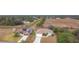 Neighborhood aerial view showing property, nearby houses, and surrounding landscape at 8054 Loxley Ave, North Port, FL 34291