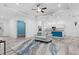 Spacious living area featuring an open floor plan with access to the kitchen at 122 Glades Dr, Rotonda West, FL 33947