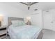 Cozy bedroom with a ceiling fan, white walls, and a comfortable bed at 14204 Heritage Landing Blvd # 724, Punta Gorda, FL 33955