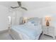 Comfortable bedroom with neutral tones, decorative pillows, and ambient lighting for relaxation at 14204 Heritage Landing Blvd # 724, Punta Gorda, FL 33955