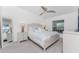 Comfortable bedroom with neutral tones, decorative pillows, and ambient lighting for relaxation at 14204 Heritage Landing Blvd # 724, Punta Gorda, FL 33955