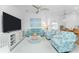 Comfortable living room with stylish decor, open layout, and adjacent modern kitchen with stainless steel appliances and bar seating at 14204 Heritage Landing Blvd # 724, Punta Gorda, FL 33955