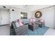 Inviting screened patio with ample seating, stylish decor, and a cozy, relaxed atmosphere at 14204 Heritage Landing Blvd # 724, Punta Gorda, FL 33955