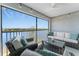 Inviting screened-in patio with comfortable seating with a lake view, ideal for relaxation and enjoying peaceful outdoor moments at 14204 Heritage Landing Blvd # 724, Punta Gorda, FL 33955