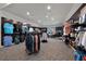 Bright retail area with wood paneling showcases a variety of golf apparel and accessories in this community's pro shop at 14204 Heritage Landing Blvd # 724, Punta Gorda, FL 33955