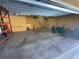 Spacious garage with shelving and ample room for storage or vehicles at 17495 Boca Vista Rd # 6, Punta Gorda, FL 33955