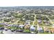 Spectacular aerial view featuring canal-front homes with boat docks in a picturesque residential area at 18536 Alphonse Cir, Port Charlotte, FL 33948