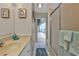 Bathroom with a single sink vanity and a glass-enclosed shower near the pool area at 18536 Alphonse Cir, Port Charlotte, FL 33948