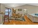 Dining area with access to pool, chandelier, and stylish decor at 18536 Alphonse Cir, Port Charlotte, FL 33948